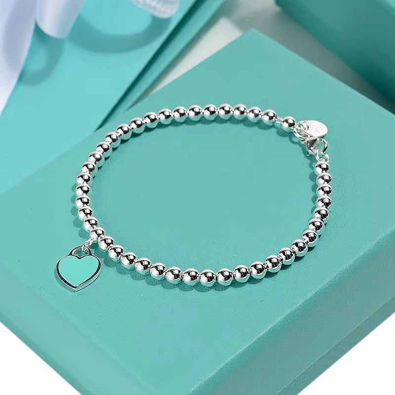 TIFFANY & CO. MINI HEART BRACELET SILVER
