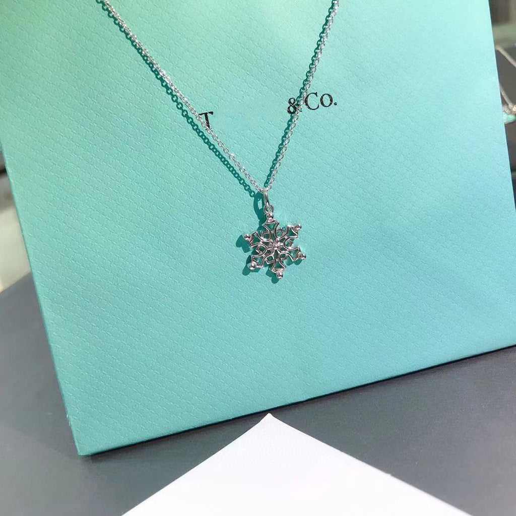 TIFFANY & CO. STERLING SILVER SNOWFLAKE PENDANT NECKLACE