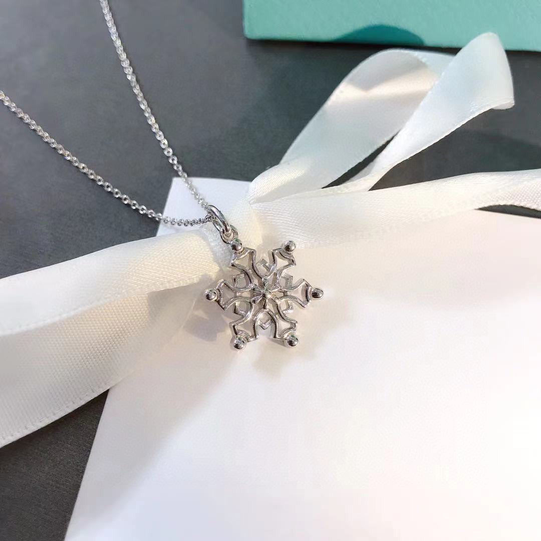 TIFFANY & CO. STERLING SILVER SNOWFLAKE PENDANT NECKLACE