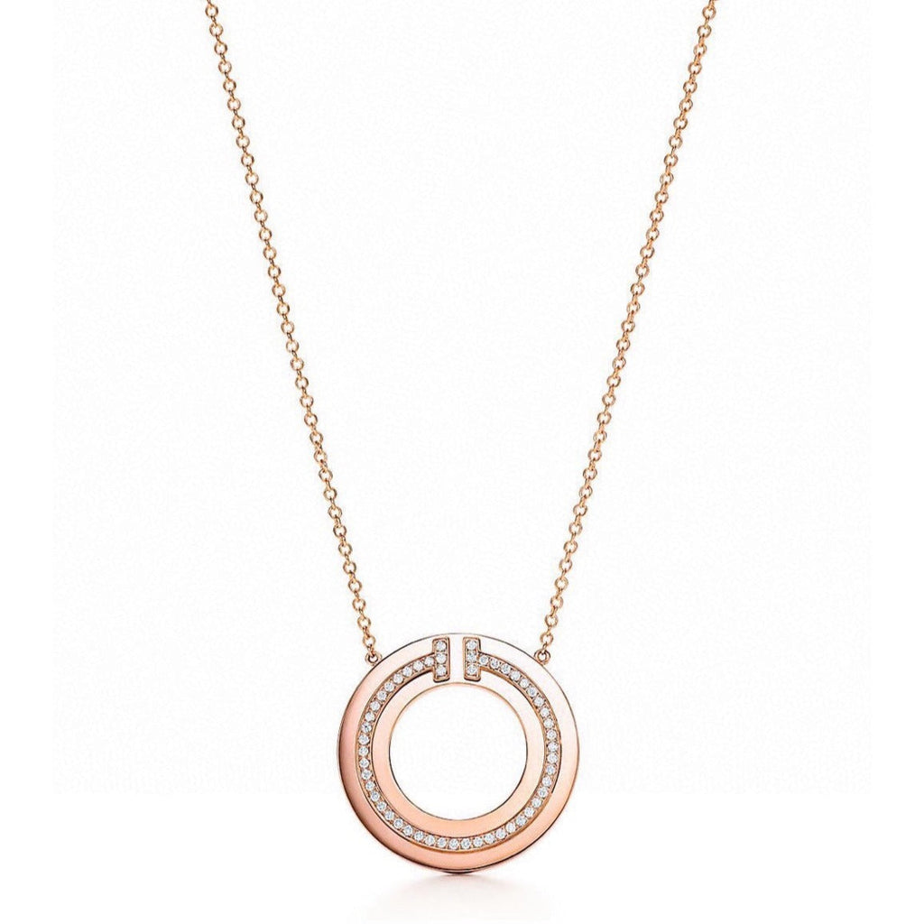 TIFFANY & CO. DIAMOND AND MOTHER OF PEARL CIRCLE PENDANT
